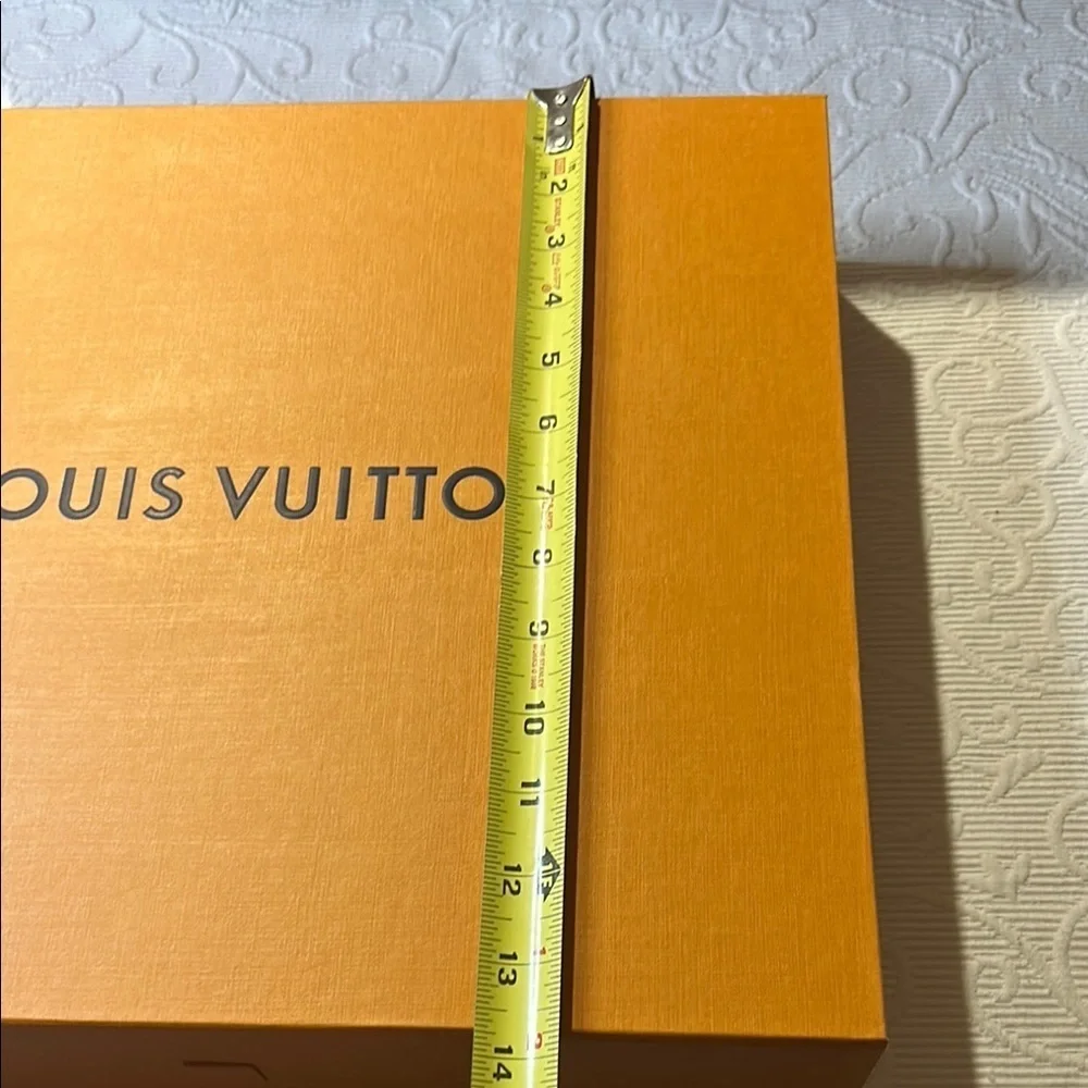 Louis Vuitton Signature  Box inside a LV shipping box with tissue and ribbon.